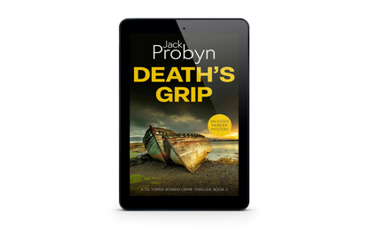 Book cover of Death’s Grip, an Essex Murder Mystery by Jack Probyn. A gritty crime thriller featuring two decaying, rusted boat hulls abandoned on a rocky shoreline at sunset. Book 2 in the DS Tomek Bowen series, perfect for fans of JD Kirk and JM Dalgliesh