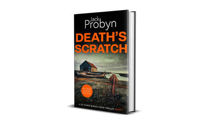 Book cover of Death’s Scratch by Jack Probyn. A gritty Essex Murder Mystery featuring an old stone boathouse and a rotting wooden ship on a marshy shoreline, with a rusted Celtic cross in the foreground. Book 9 in the DS Tomek Bowen series, perfect for fans of JD Kirk and JM Dalgliesh