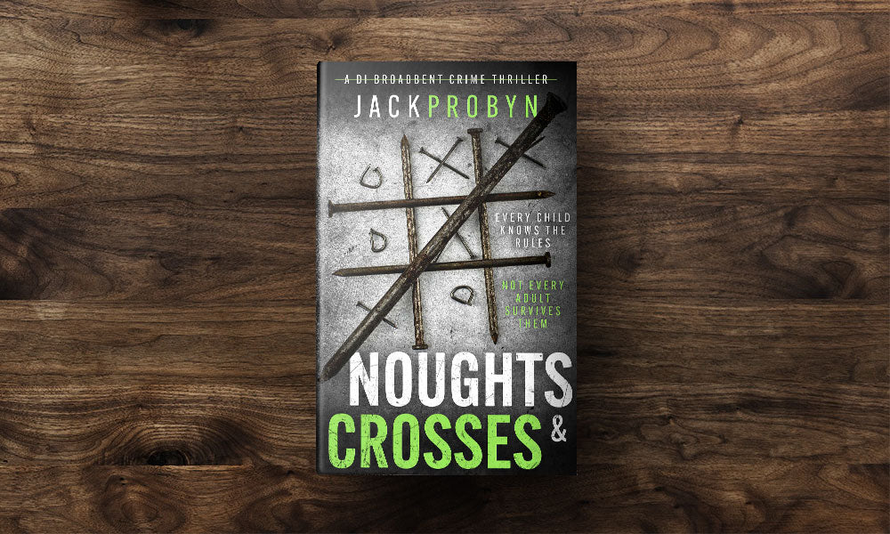 Book cover for Noughts & Crosses, a DI Broadbent crime thriller by Jack Probyn. Large, rusted iron nails are arranged on a scratched metallic surface to form a tic-tac-toe game board, with small bent nails acting as the "noughts.”