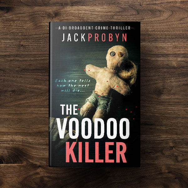 Book cover for The Voodoo Killer, a DI Broadbent crime thriller by Jack Probyn. The image features a weathered, hand-stitched voodoo doll with button eyes and red-tipped pins stuck into its limbs against a dark, textured background